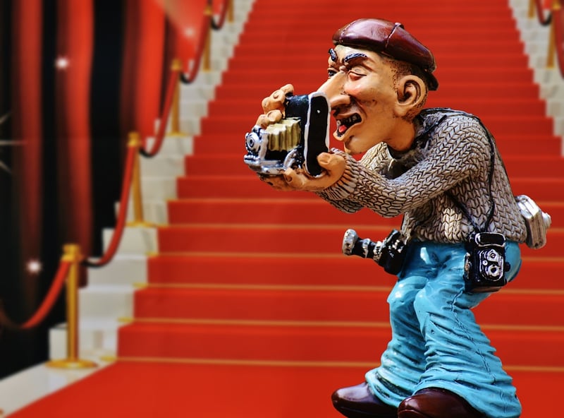 Paparazzi capturing a celebrity feud